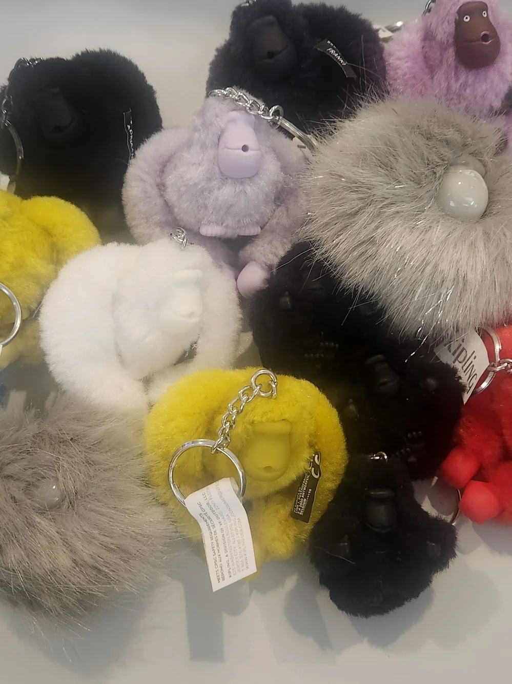 Kipling Plush Monkey Keychain - Yellow, White, Black, Gray, Purple